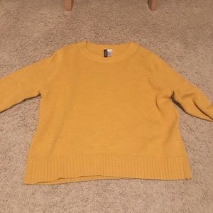yellow sweater